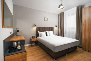 Отель Labirint Hotel Бухарест Стандартный двухместный номер с 1 кроватью или 2 отдельными кроватями-1